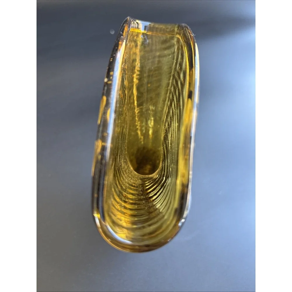 Mid-Century Modern Amber Glass Fan Vase featuring an optic ribbed pattern.